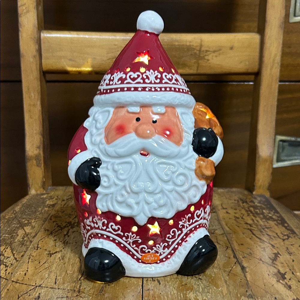 Adorable Santa Claus Ceramic Light. Like new, with original decal and tag.